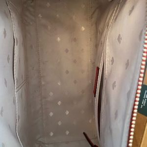 Kate Spade dome purse in cherry red.